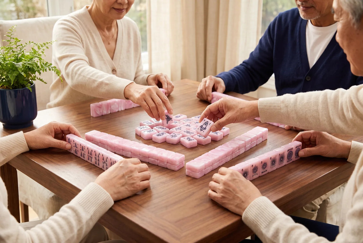 Older adults enjoying a game of mahjong together in a bright sunroom