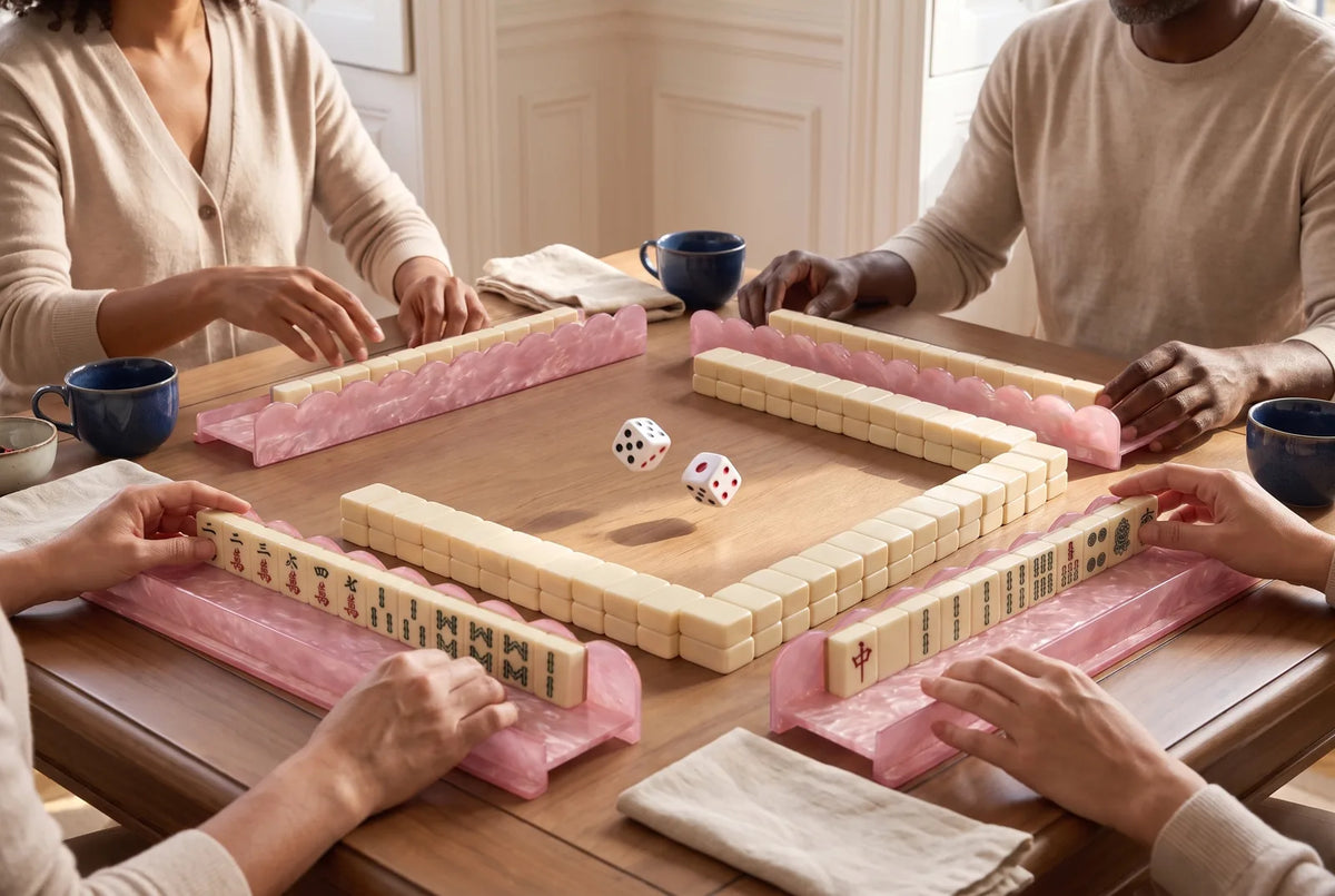 Two dice on a mahjong table between walls of tiles and pink racks